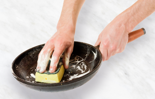 Cleaning cast Iron with sponge